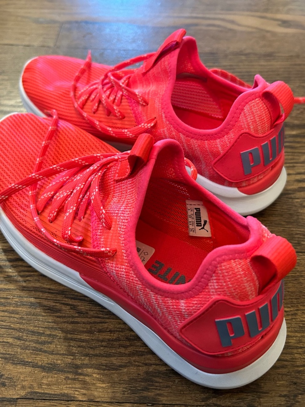 Hot pink puma sneakers